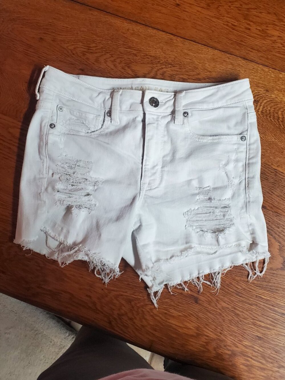American Eagle distressed white denim shorts